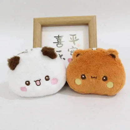 Adorable Dudu and Bubu plush coin wallets in white and brown, perfect for organizing coins and essentials.
