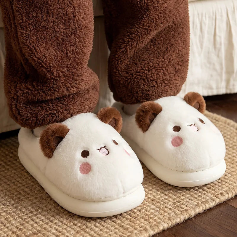 White panda Bubu and Dudu slippers worn with socks