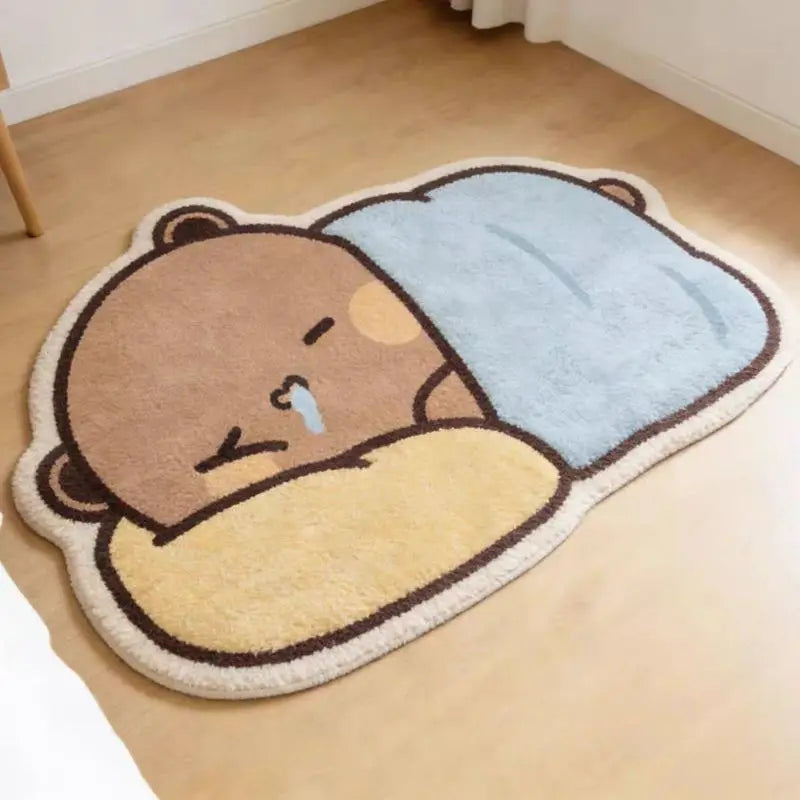 Bubu and Dudu brown bear sleeping under a blanket plush rug
