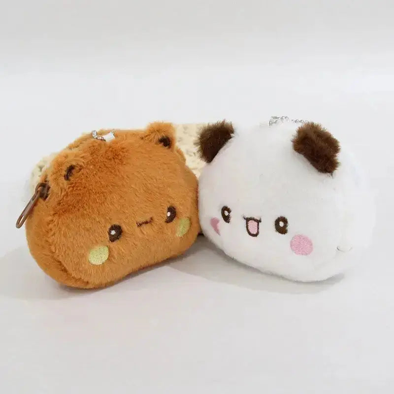 Cute Dudu and Bubu coin wallets in plush fabric, perfect for storing coins and cards.